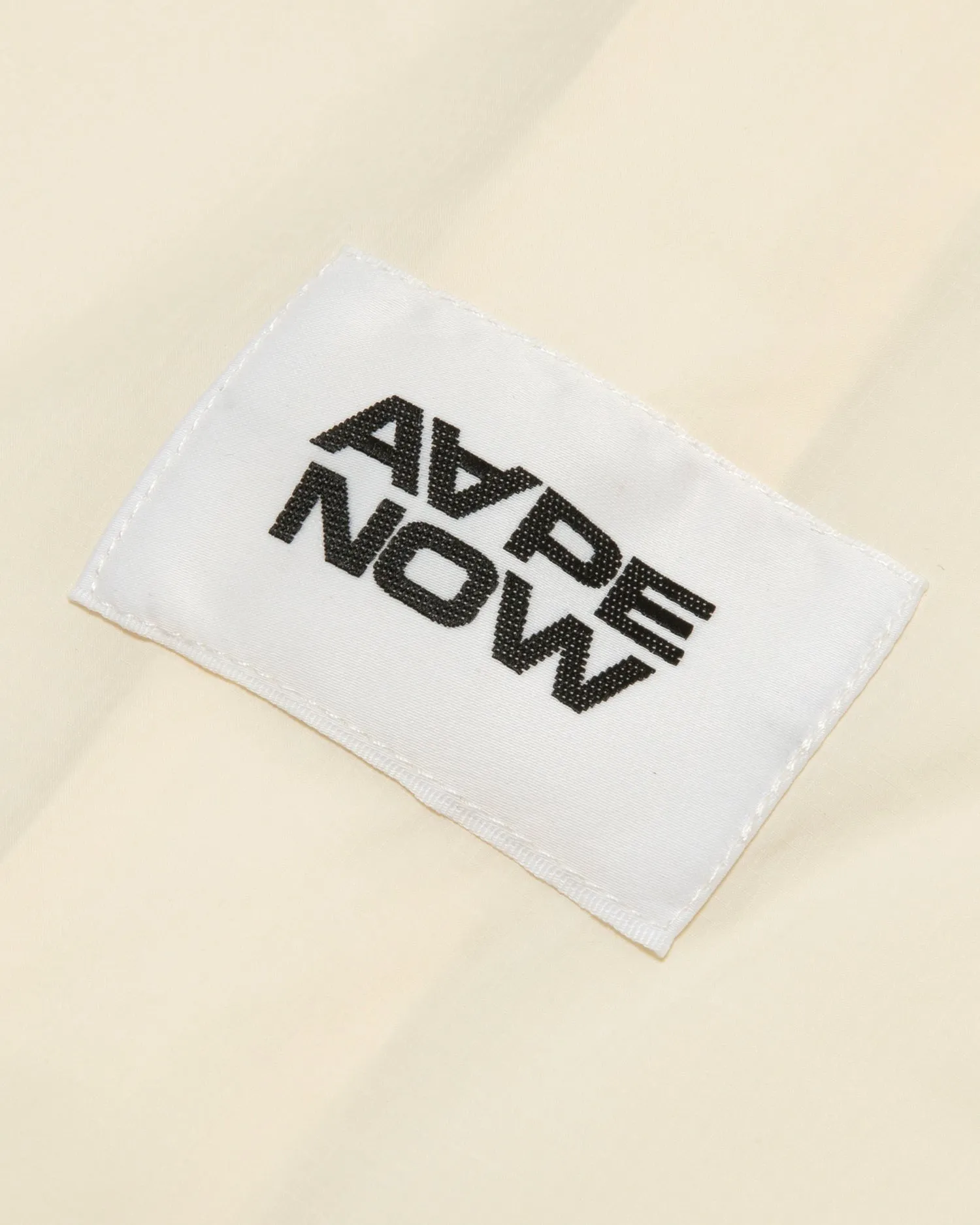 AAPENOW moonface logo windbreaker jacket
