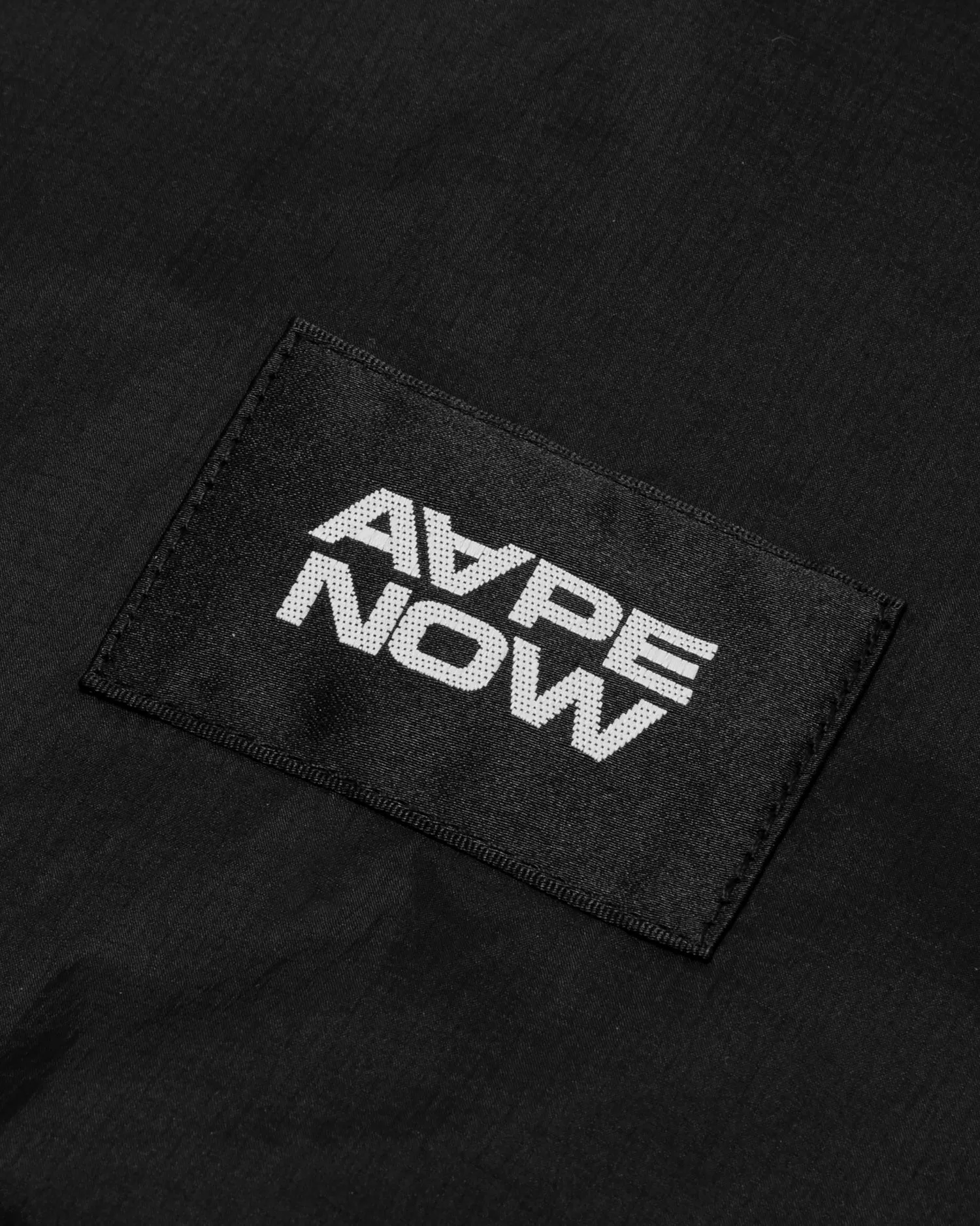 AAPENOW moonface logo windbreaker jacket